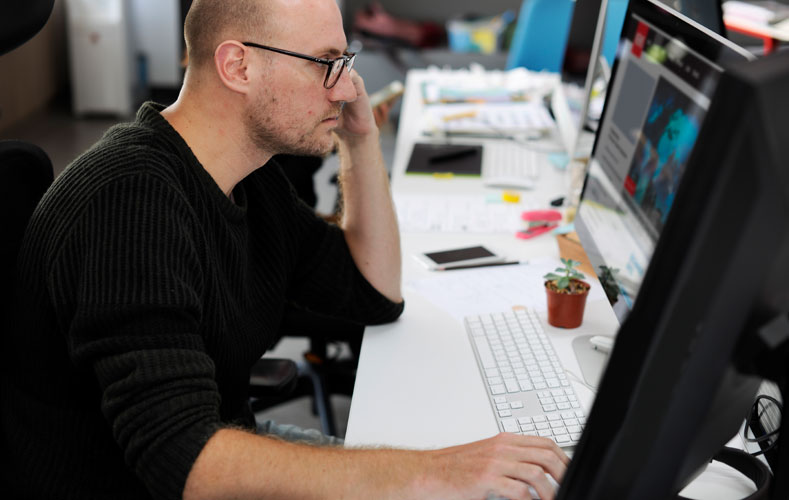 Website Designer checks Responsive Web Designs